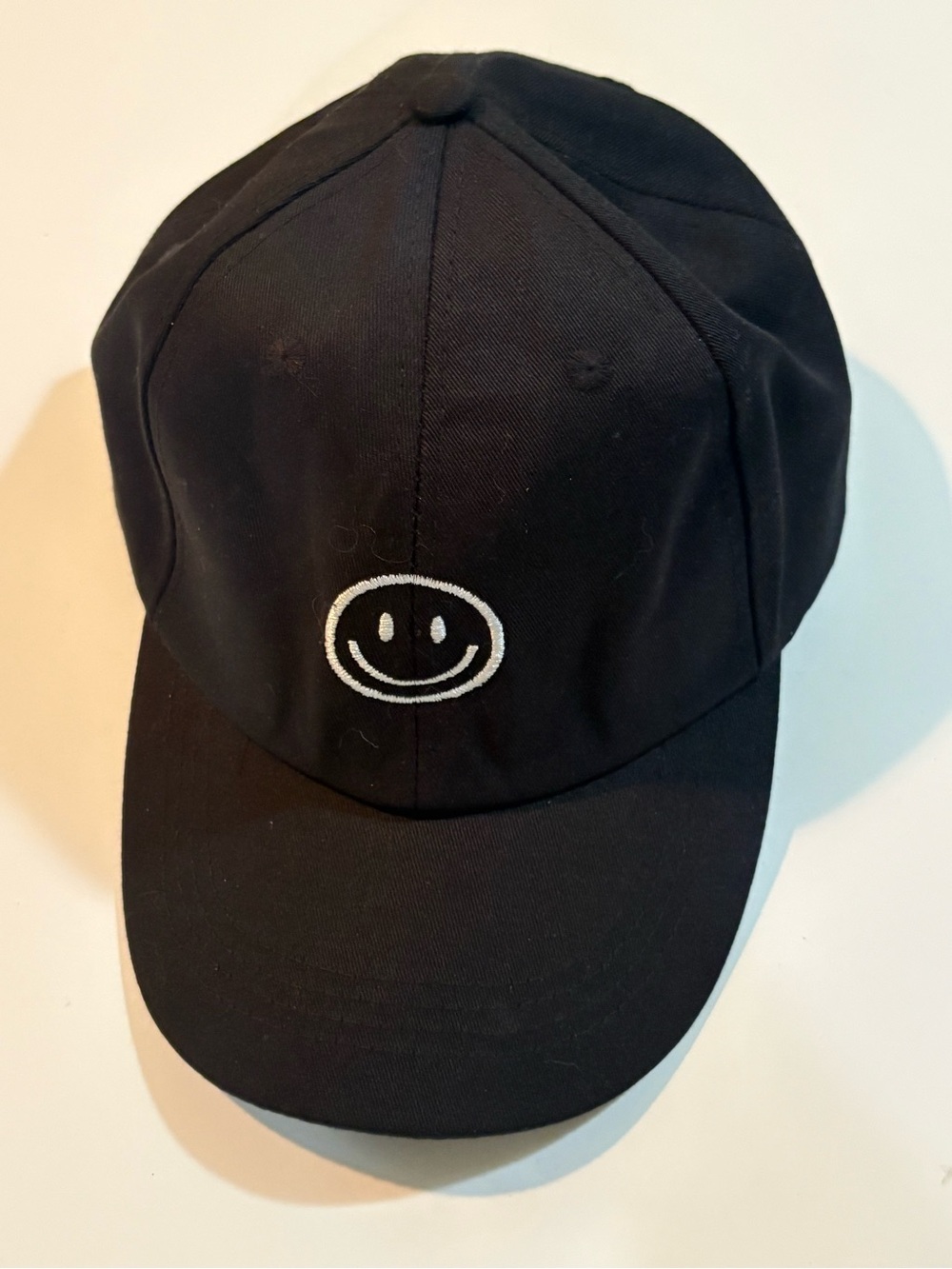 Black,  Smile Logo, 6 panel “Dad Hat” Baseball Cap